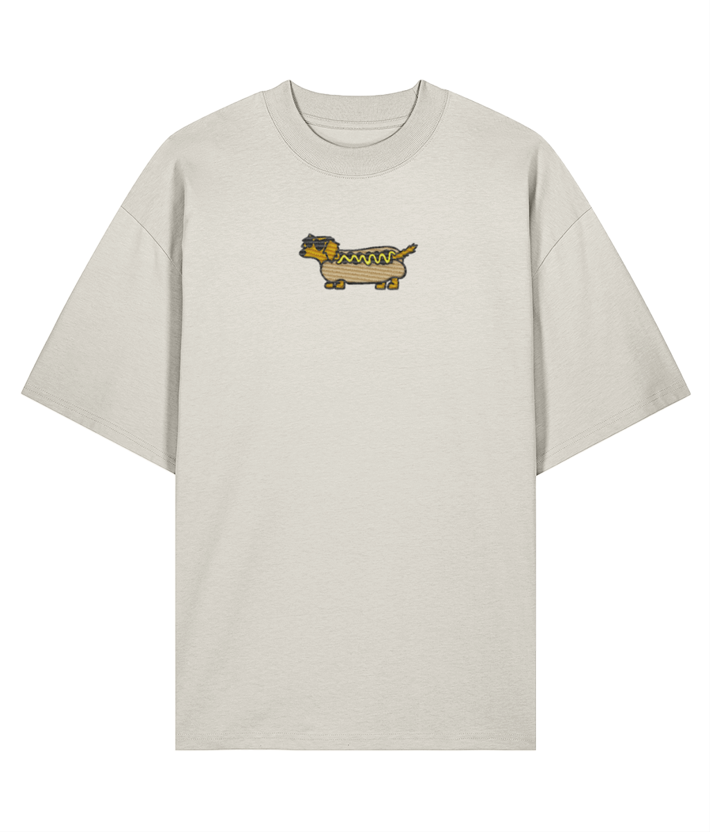 Flat lay of cream oversized embroidered t-shirt with sausage dog graphic, 100% organic cotton